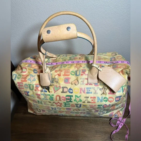 Dooney & Bourke Vintage travel bag. - Picture 15 of 16